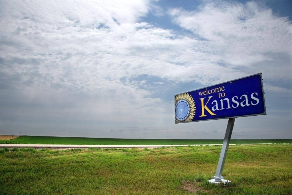 welcome to Kansas sigh at highway